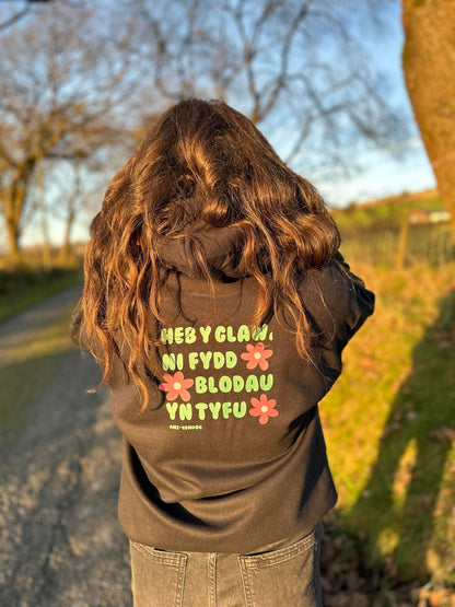 Hwdi Heb y glaw, ni fydd blodau'n tyfu Hoody